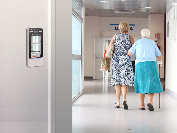 face scanner on wall in care home