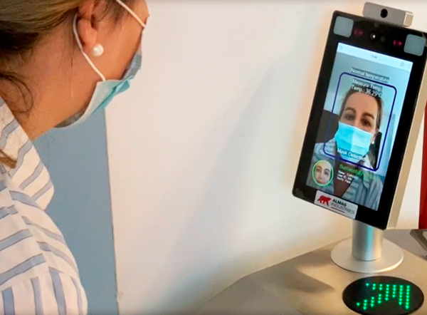 facial recognition reader with user wearing a face mask