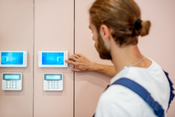 workman setting up video intercom