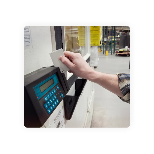 person using a swipe card clock in machine