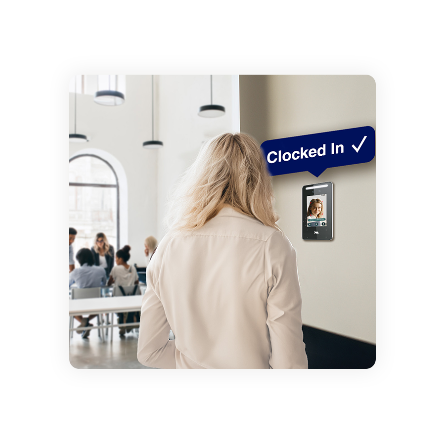 woman clocking in using a facial reader