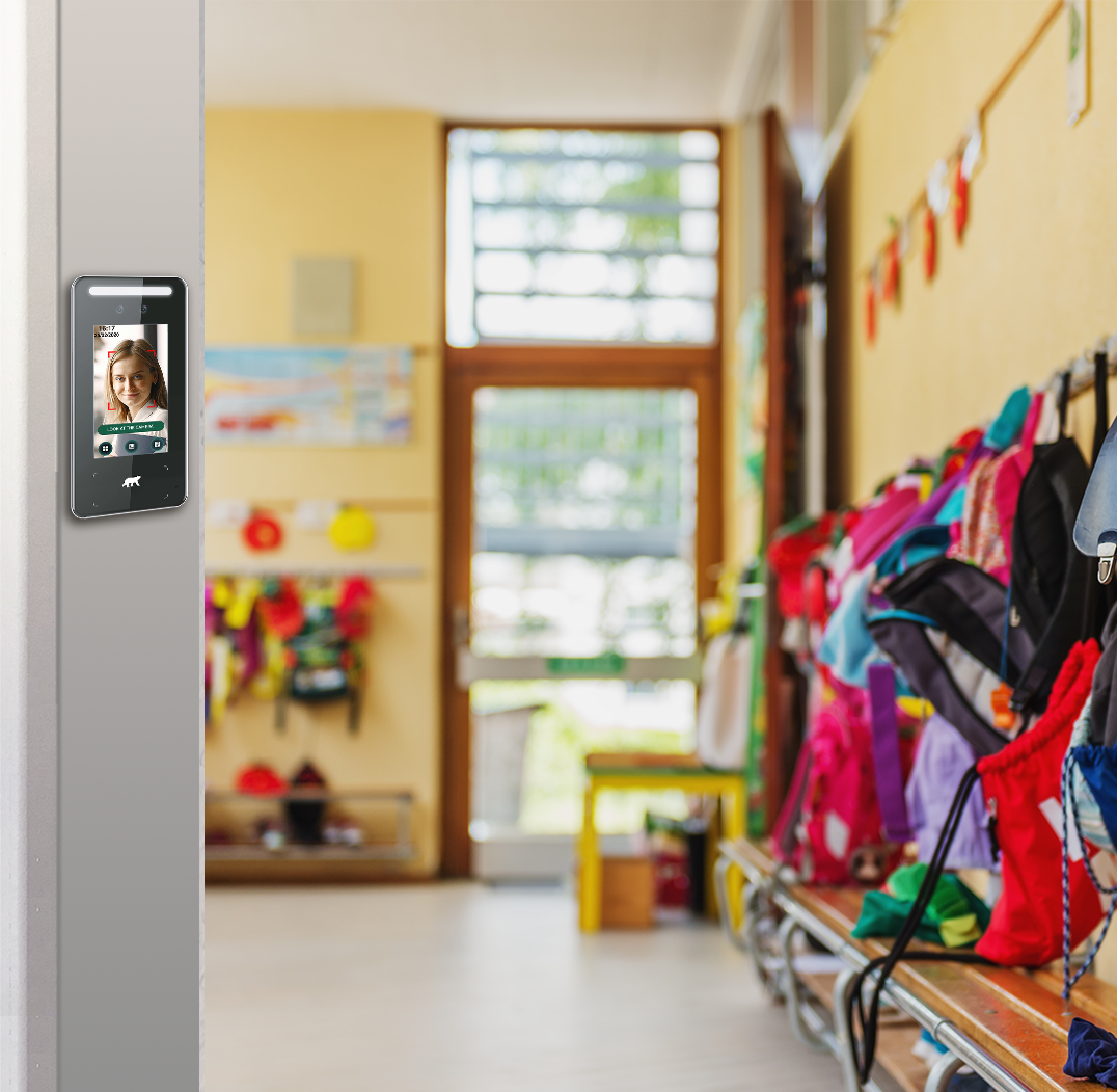 nursery entrance hall with facial reader on wall and lots of kids bags