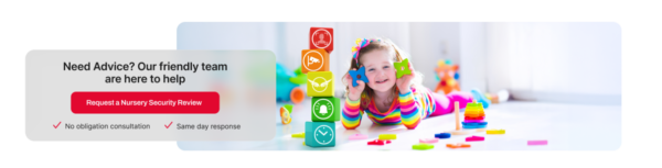 A little girl lying on the floor surrounded by building blocks and toys